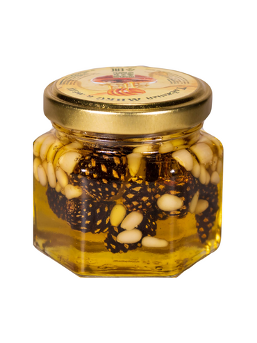 Honey mix with pine nuts and pine cones
