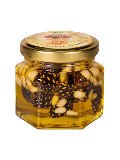 Honey mix with pine nuts and pine cones